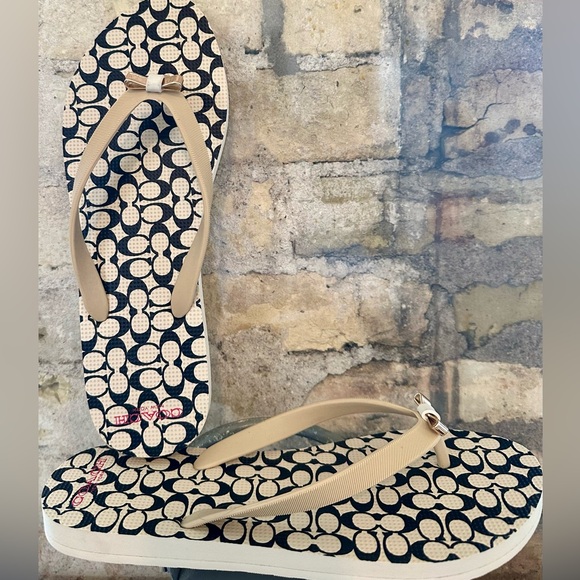 Coach Shoes - Coach Amel Signature C Thong Sandals in a black and beige colorway.